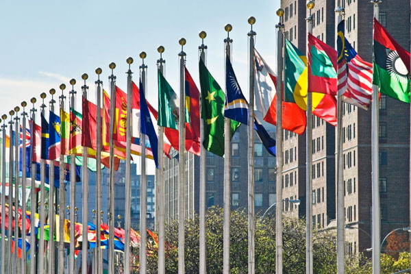 Image of the flags outside of the United Nations building